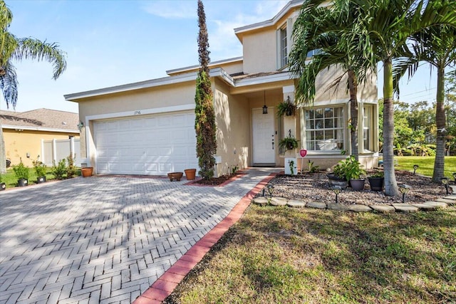 view of front of property with a garage