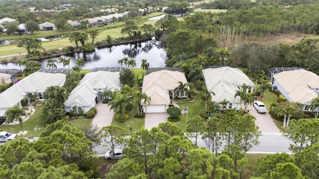 drone / aerial view with a water view