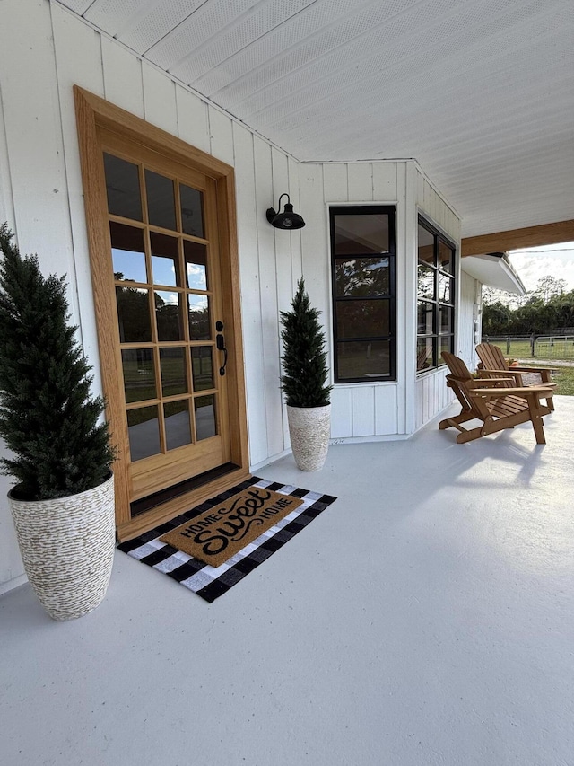 entrance to property with a porch