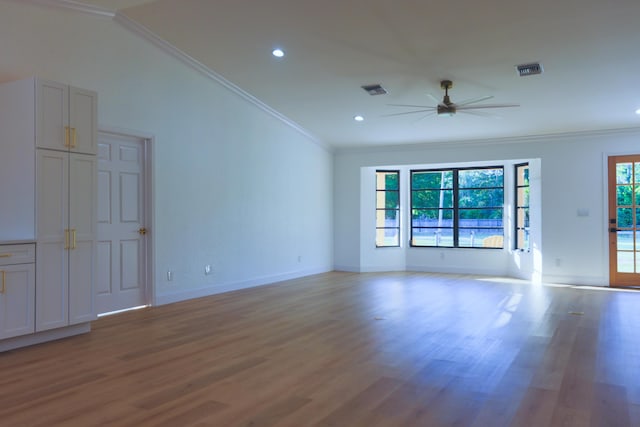 interior space with light hardwood / wood-style floors, ceiling fan, and ornamental molding