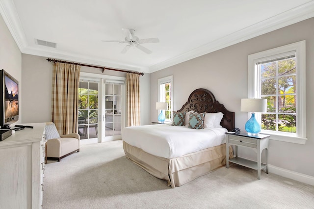 carpeted bedroom with ceiling fan, crown molding, access to outside, and multiple windows