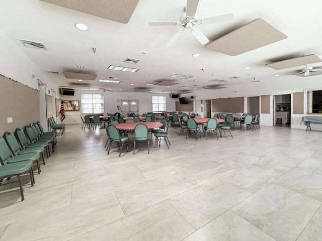 dining area with ceiling fan