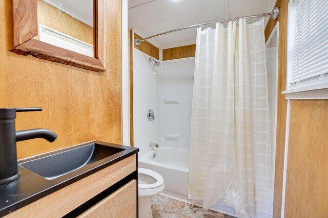 full bathroom with shower / bath combo, toilet, and sink