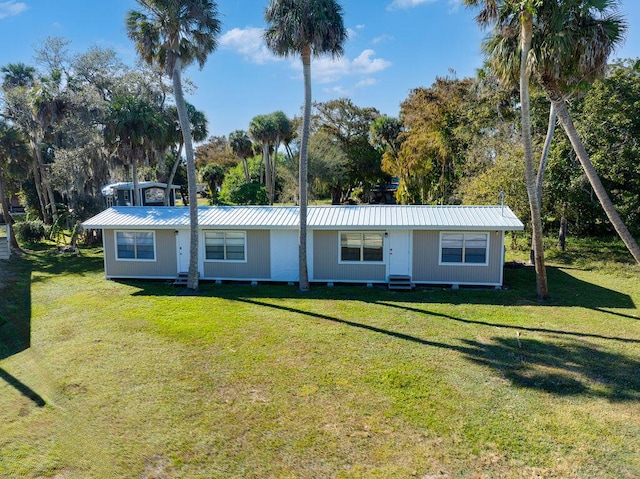 view of front of home with a front yard