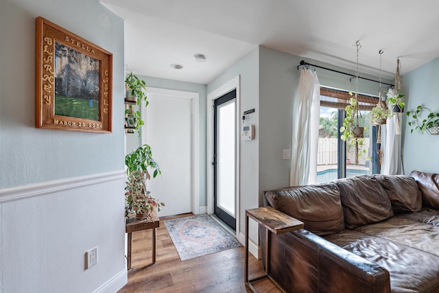 entryway with dark hardwood / wood-style floors