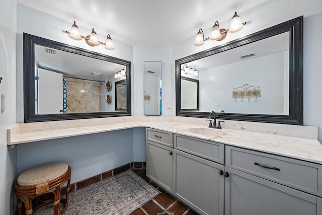 bathroom with vanity and a shower with shower curtain