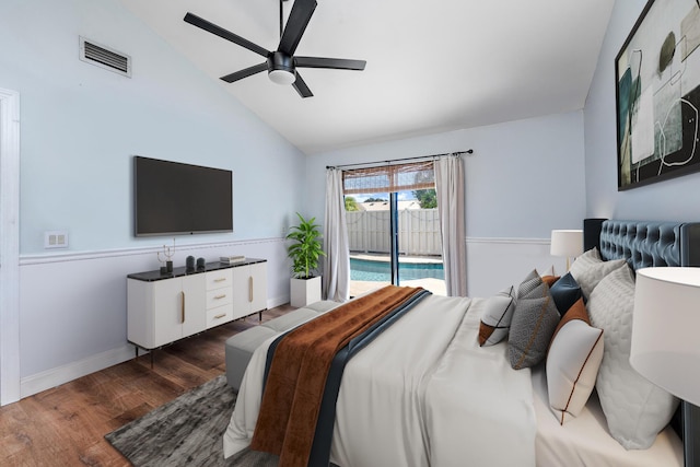 bedroom with access to exterior, dark wood-type flooring, ceiling fan, and vaulted ceiling