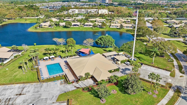 birds eye view of property featuring a water view