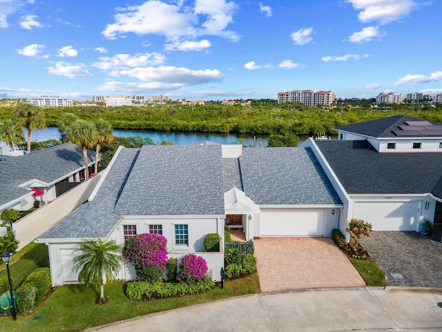 drone / aerial view featuring a water view