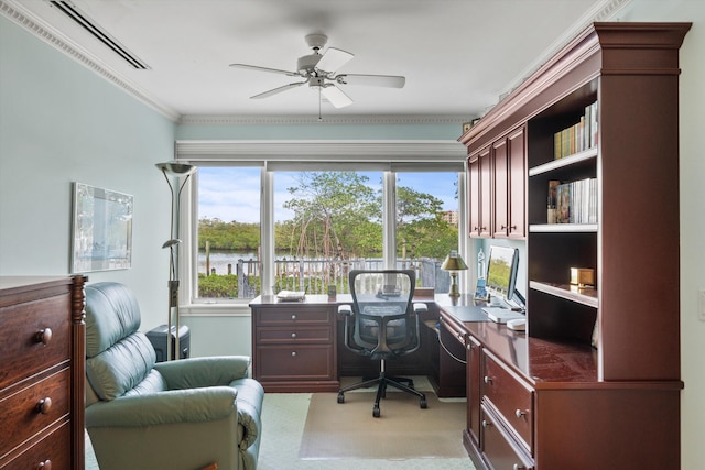 carpeted office space with crown molding, a healthy amount of sunlight, and ceiling fan