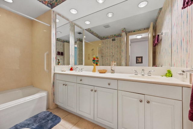 bathroom featuring tile patterned flooring and vanity