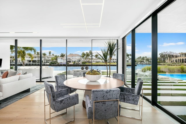 sunroom with a water view