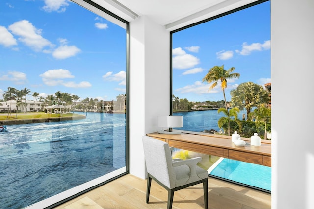 sunroom with a water view