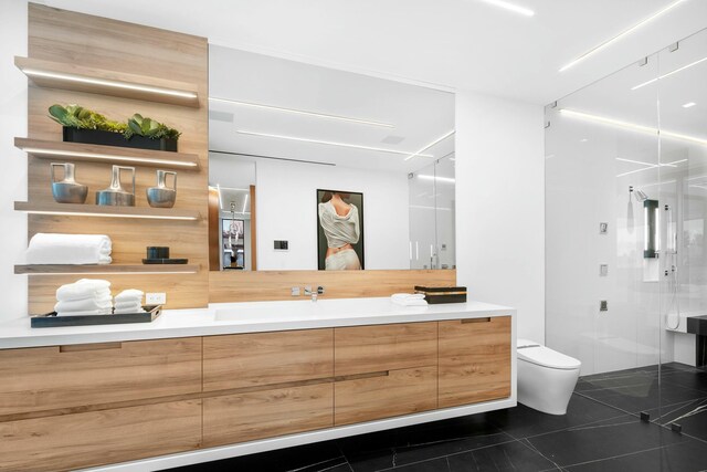 bathroom with tile patterned floors and a shower