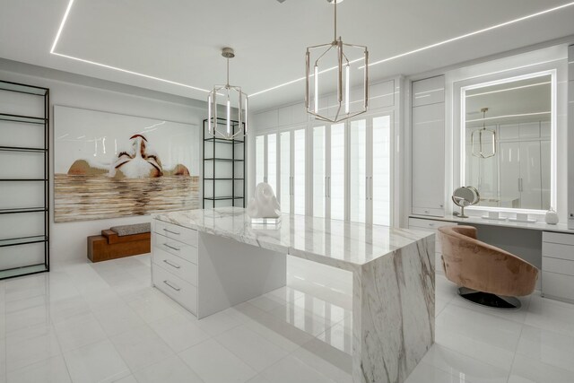 interior space featuring light wood-type flooring and a water view