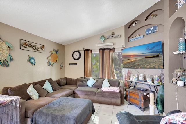 living room with light tile patterned floors and vaulted ceiling