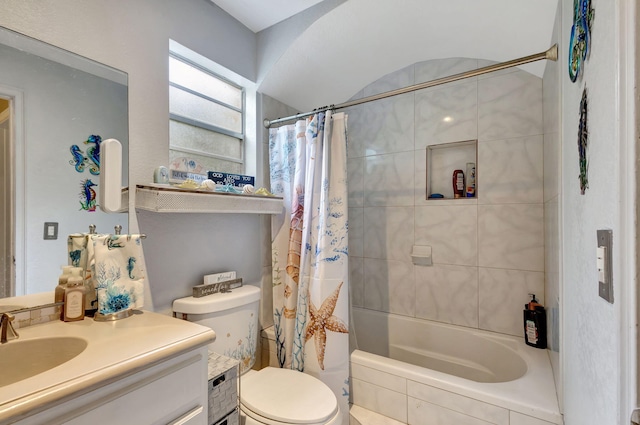 full bathroom featuring vanity, toilet, and shower / tub combo