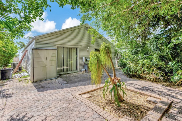 rear view of property featuring a patio