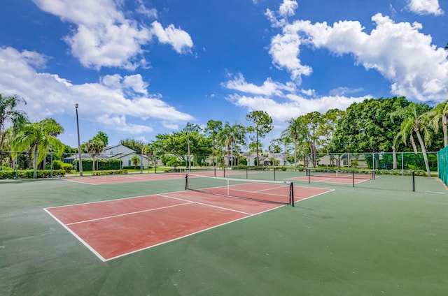 view of sport court with basketball hoop