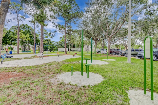 view of community featuring a yard