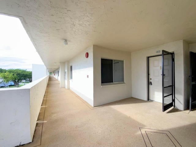 view of patio / terrace with a balcony