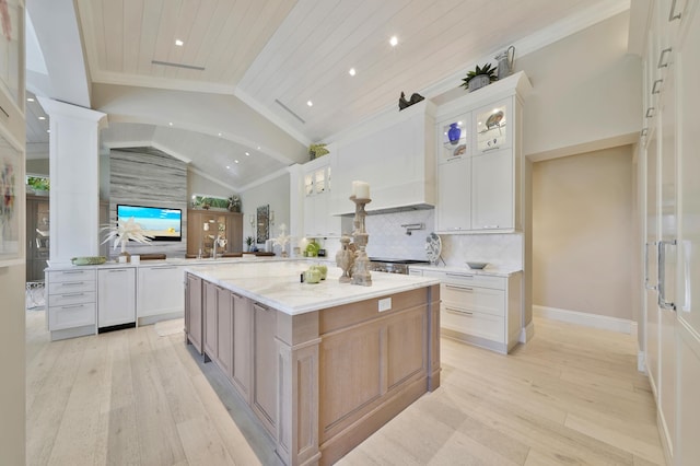 kitchen featuring lofted ceiling, light stone countertops, light wood-type flooring, white cabinetry, and wood ceiling