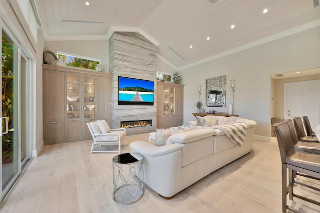 living room with light wood-type flooring, a fireplace, high vaulted ceiling, and wooden ceiling