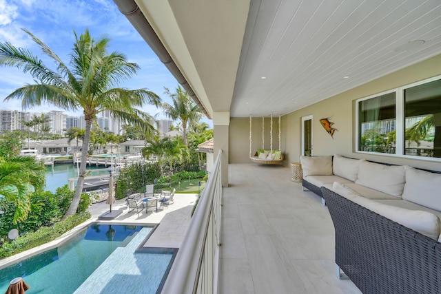 exterior space with outdoor lounge area and a water view