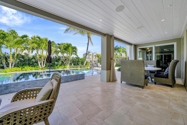 view of patio / terrace featuring a water view