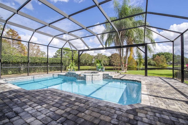 view of pool featuring an in ground hot tub, glass enclosure, and a patio