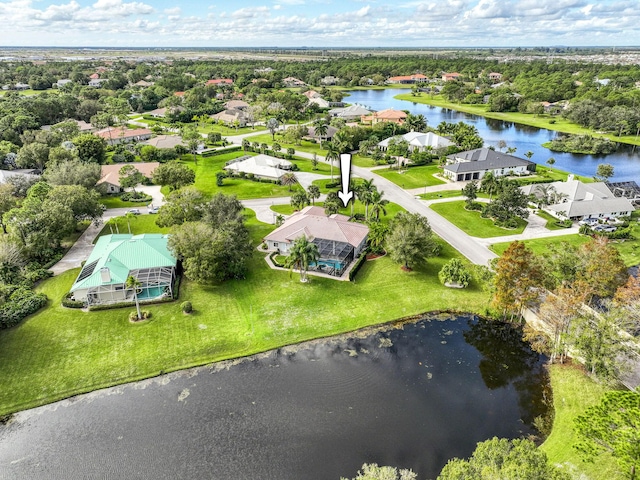 drone / aerial view with a water view