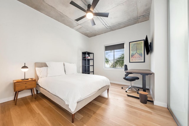 bedroom featuring ceiling fan and light hardwood / wood-style floors