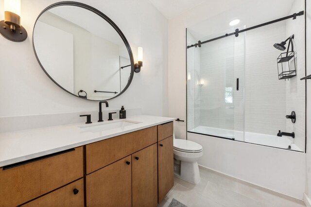 laundry room featuring electric panel, cabinets, and stacked washer and clothes dryer