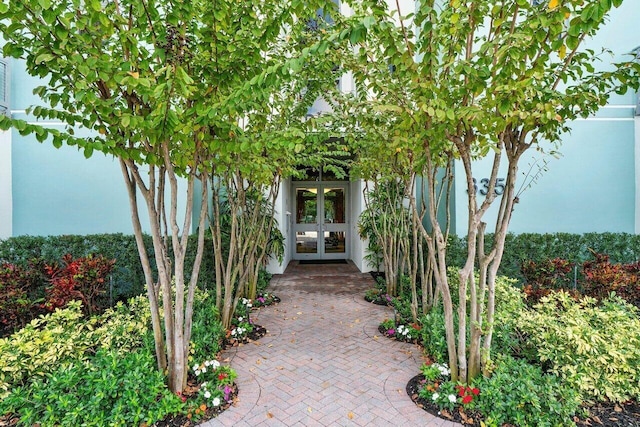 property entrance featuring french doors