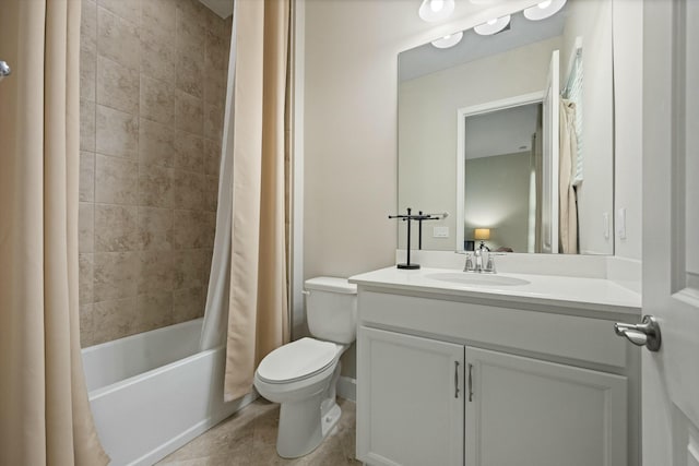 full bathroom featuring tile patterned floors, shower / tub combo with curtain, vanity, and toilet