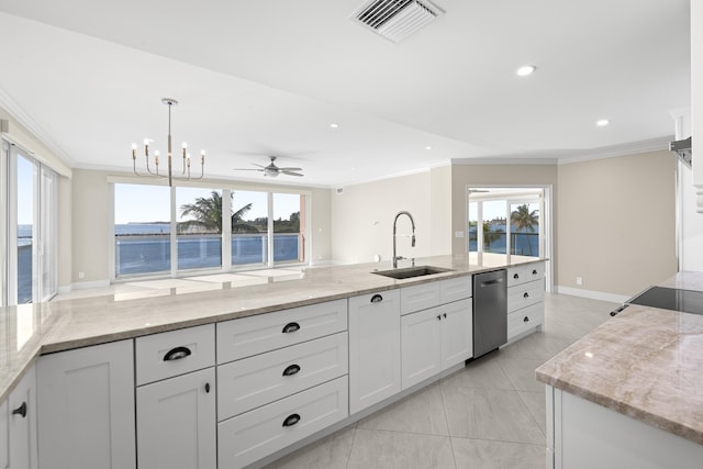 kitchen with stainless steel dishwasher, ceiling fan with notable chandelier, sink, a water view, and white cabinetry