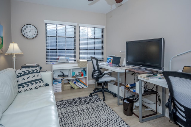 office space with ceiling fan and wood finished floors