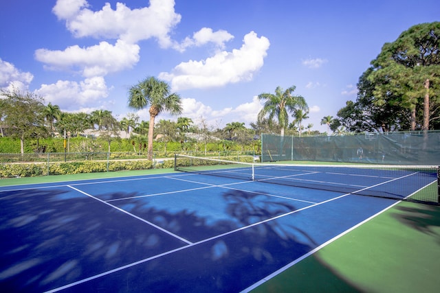 view of sport court featuring community basketball court and fence