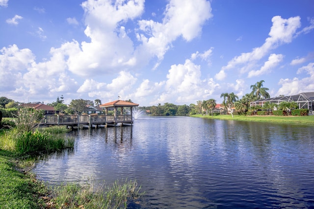 dock area featuring a gazebo and a water view