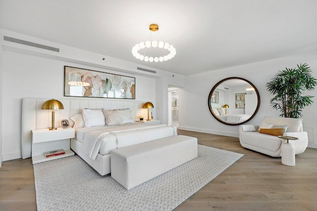 bedroom featuring hardwood / wood-style flooring