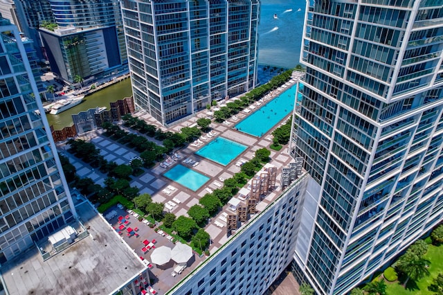 birds eye view of property featuring a water view