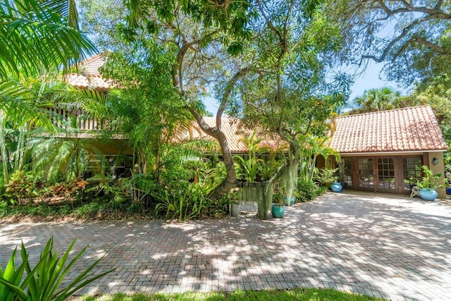 805 Pelican Ln, Lantana, FL 33462 - view of patio / terrace featuring french doors