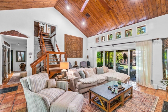 tiled living room with wooden ceiling and high vaulted ceiling