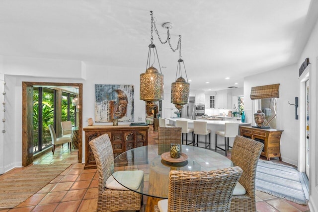 dining space with light tile patterned floors