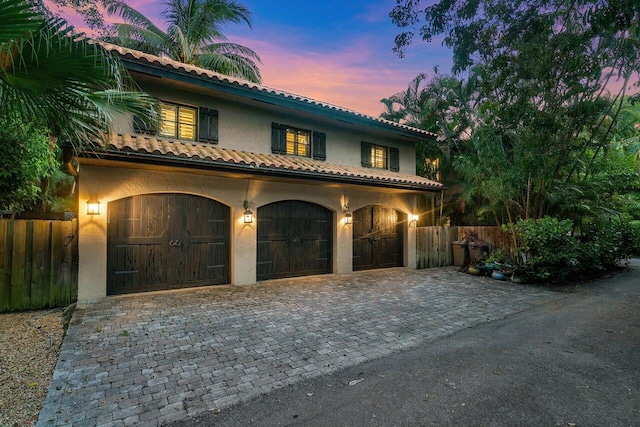 view of front of home with a garage