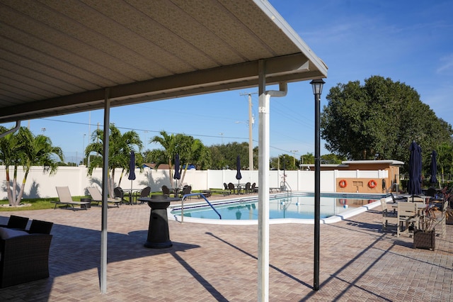 view of pool with a patio