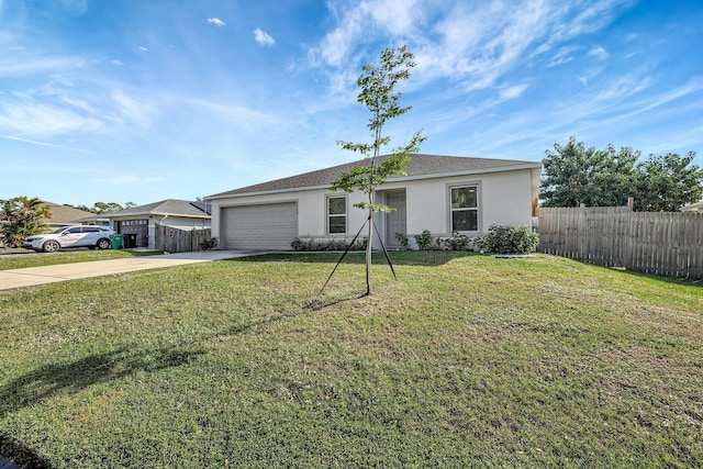 ranch-style home with a garage and a front yard