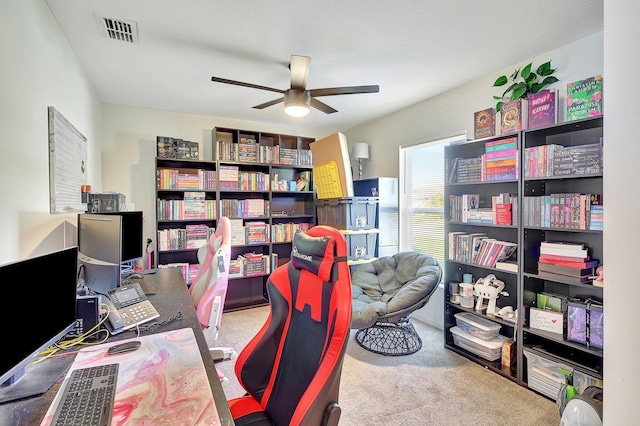 office with light carpet and ceiling fan