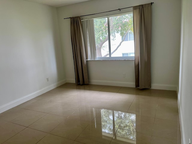 view of tiled spare room