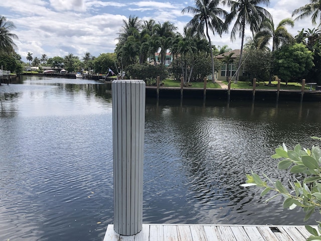 dock area featuring a water view